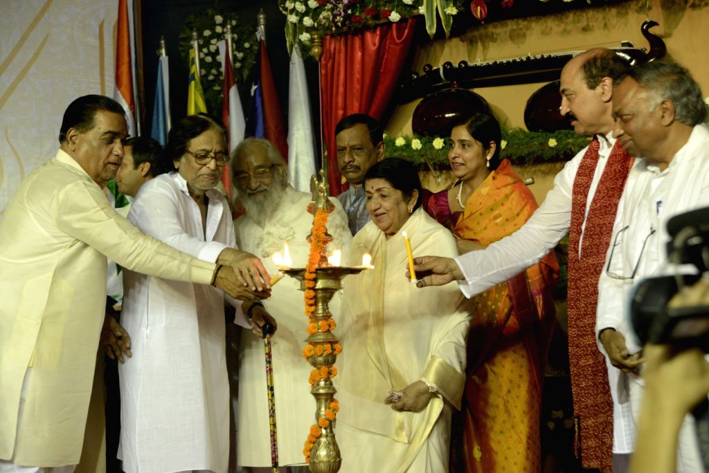 Lamp lighting with Lata Mangeshkar at cultural ceremony
