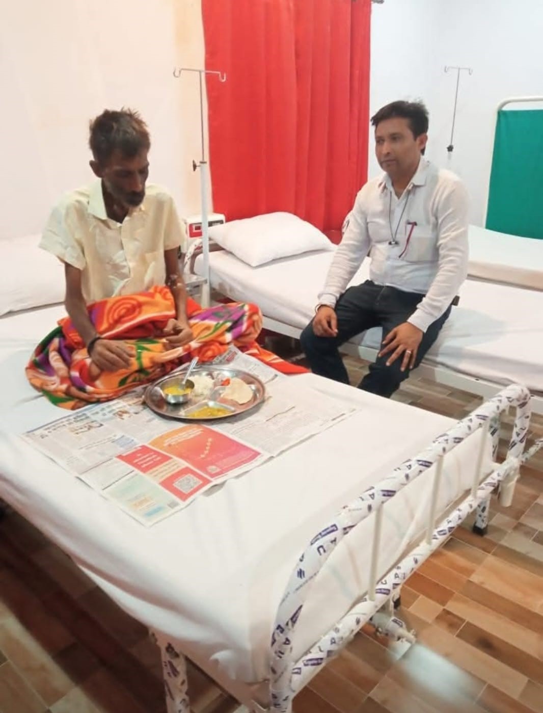 Patient receiving warm meal at hospital — care and nourishment